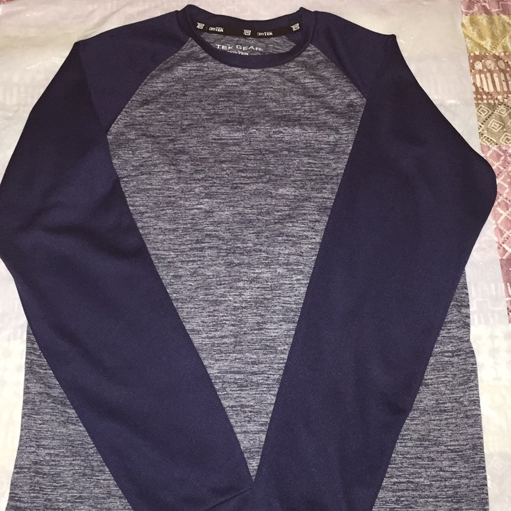 This is a long sleeve navy sportswear drytek shirt